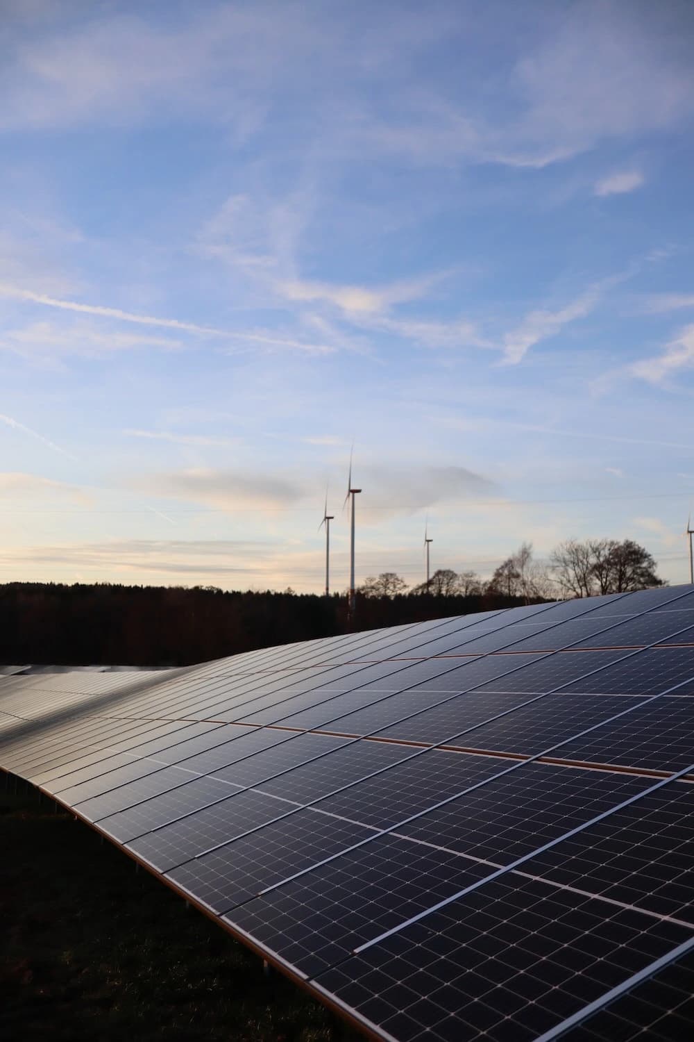 Solar park with grass in the foreground